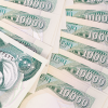 Iraqi dinars, from Wollertz, Shutterstock