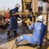Oil workers at East Baghdad field (Min of Oil)